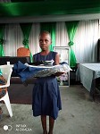 Student receiving school package donation